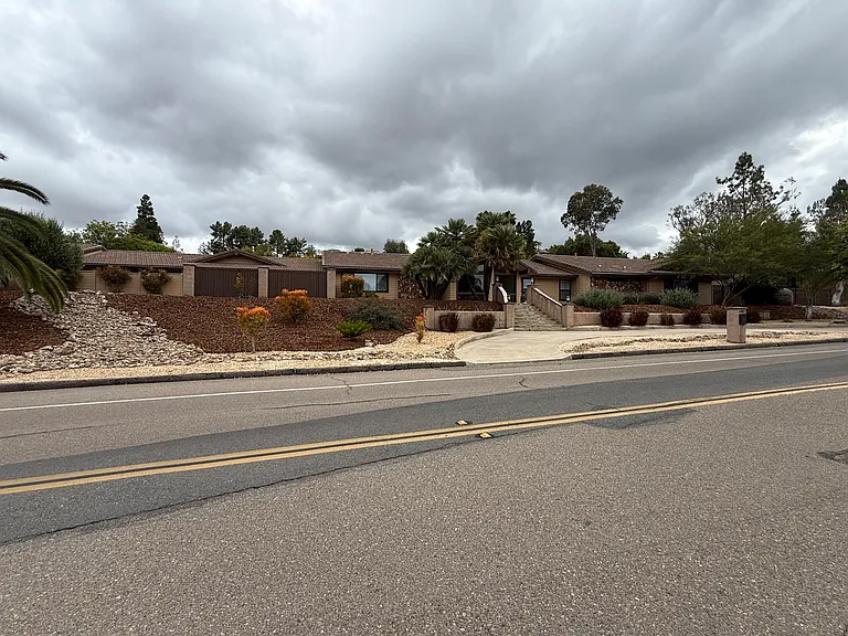 View of front of house with circular driveway