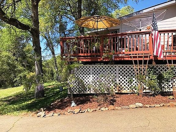 Front Deck and Parking Area.