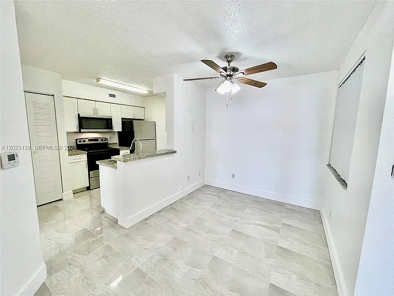 2880 N Oakland Forest Dr #103 — Photo 3