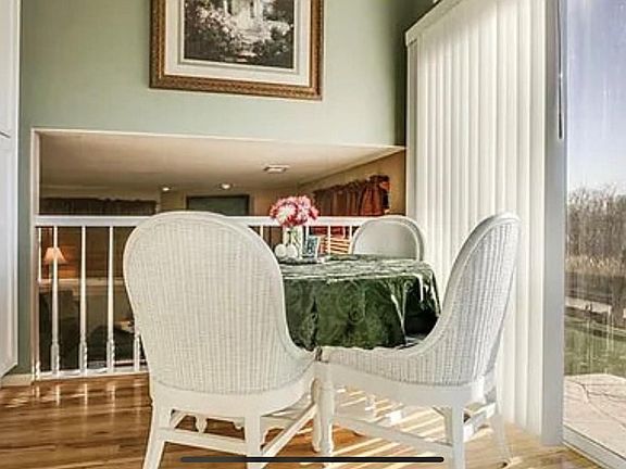 Kitchen nook looking out on green space and cherry creek.