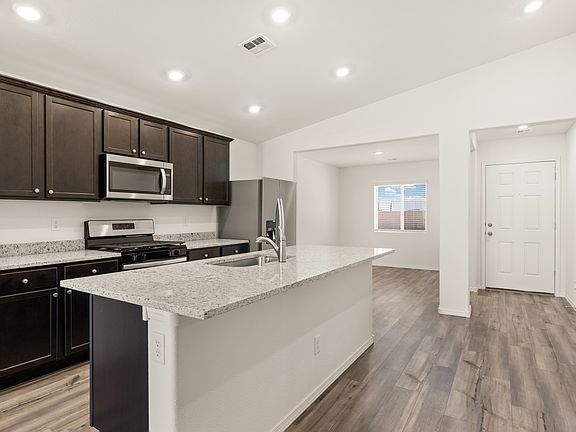 The kitchen comes with stainless-steel appliances