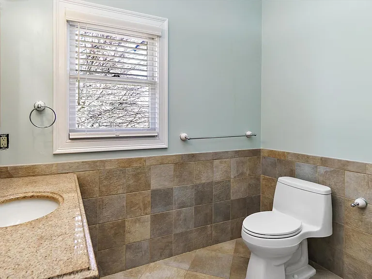 En-suite Master Bedroom bathroom with full glass shower