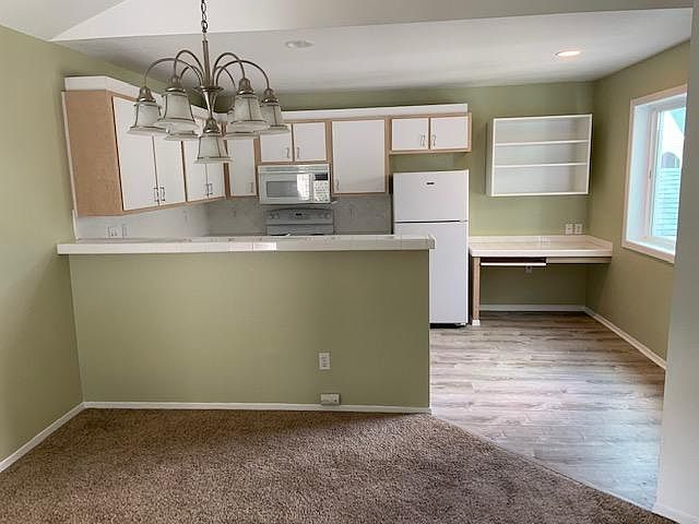 Kitchen with pantry and built-in desk
