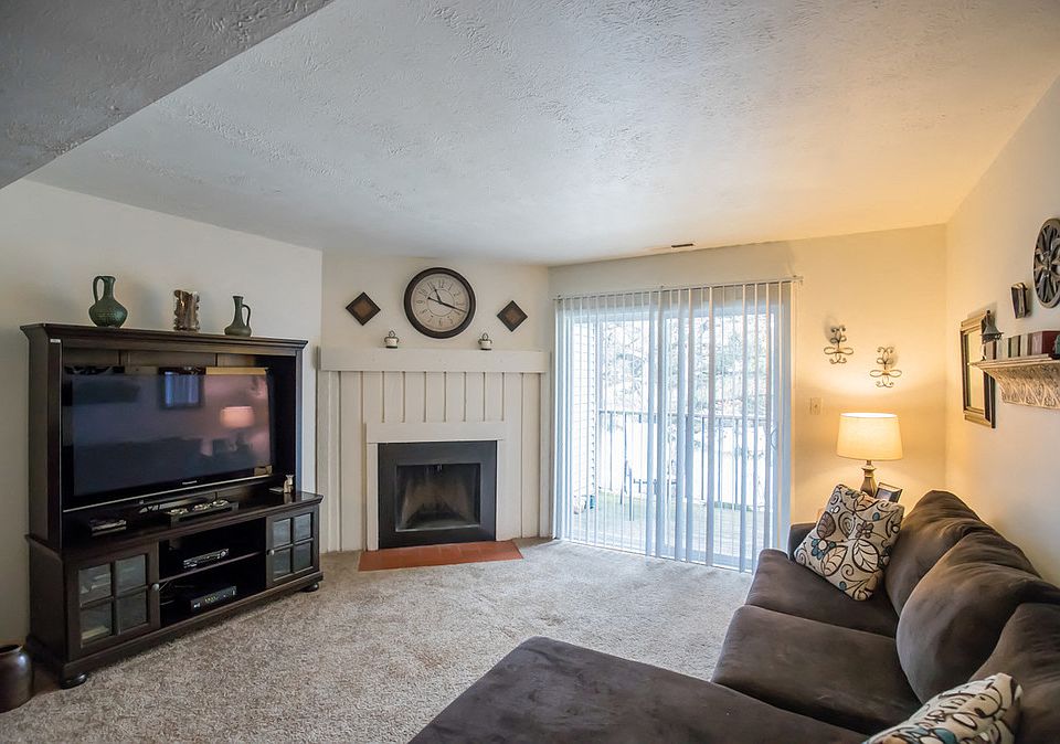 Spacious Living Area with Cozy Fireplace