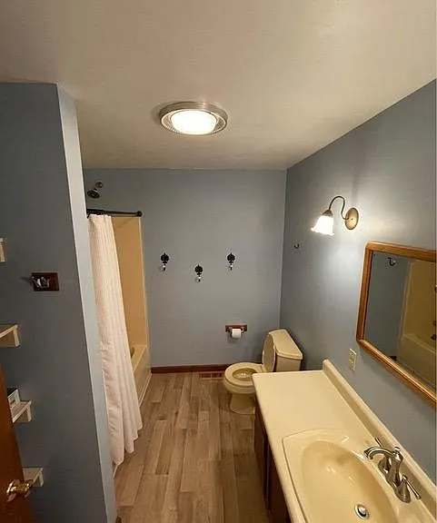 Full bathroom with bath