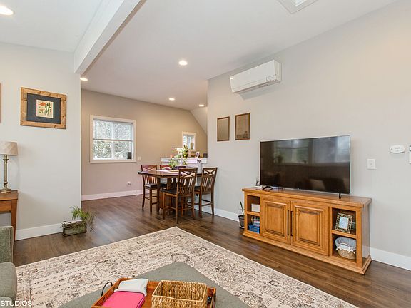 Living room with beatiful hardwood floors throughout.