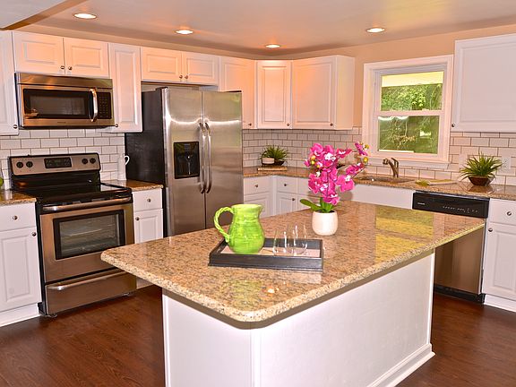 Beautiful updated kitchen with white cabinetry