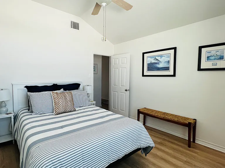Bedroom #1 with queen size bed. Large walk-in closet.