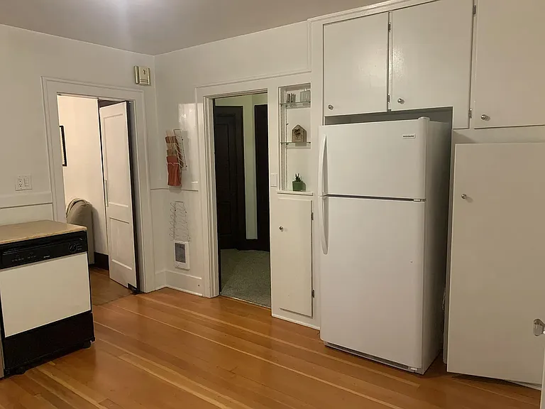 Kitchen (left side; entry way to bedrooms, bathroom and upstairs stairwell)