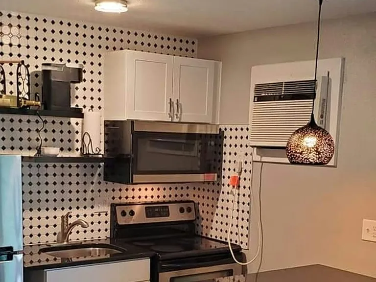 Contemporary tiled kitchen with granite