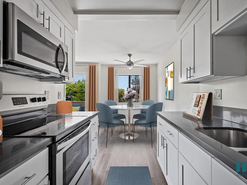 Kitchen with Energy-Efficient Appliances and Ample Cabinet Storage