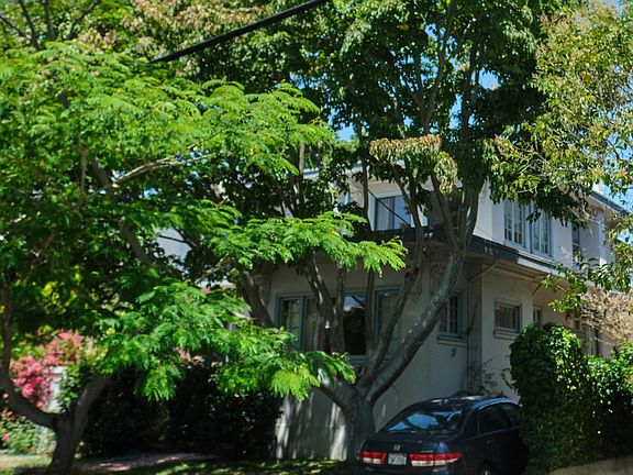 A large maple tree shades and screens the south facing home.