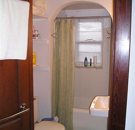 Master bedroom bathroom with bathtub