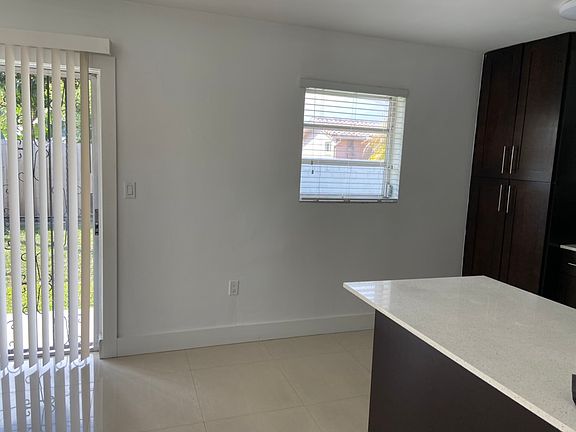 kitchen to dining room and backdoor slider