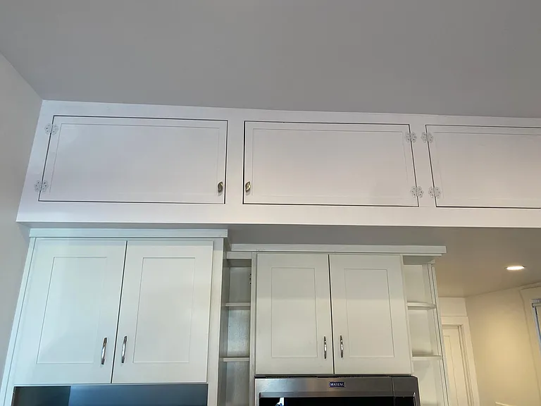 LARGE AUXILIARY STORAGE ABOVE KITCHEN