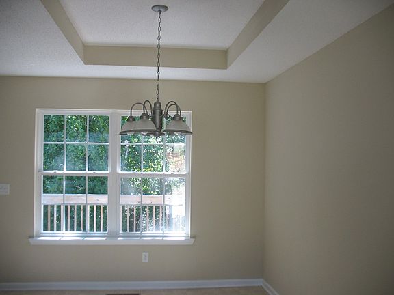 large dining area w. cathedral ceiling
