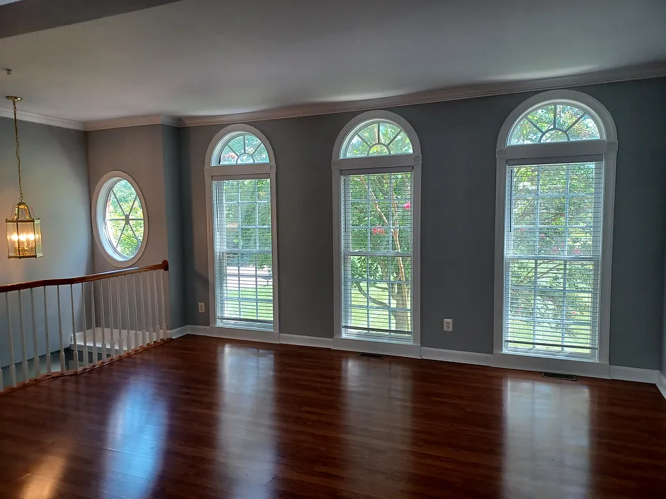 Living room with wood floors, freshly painted