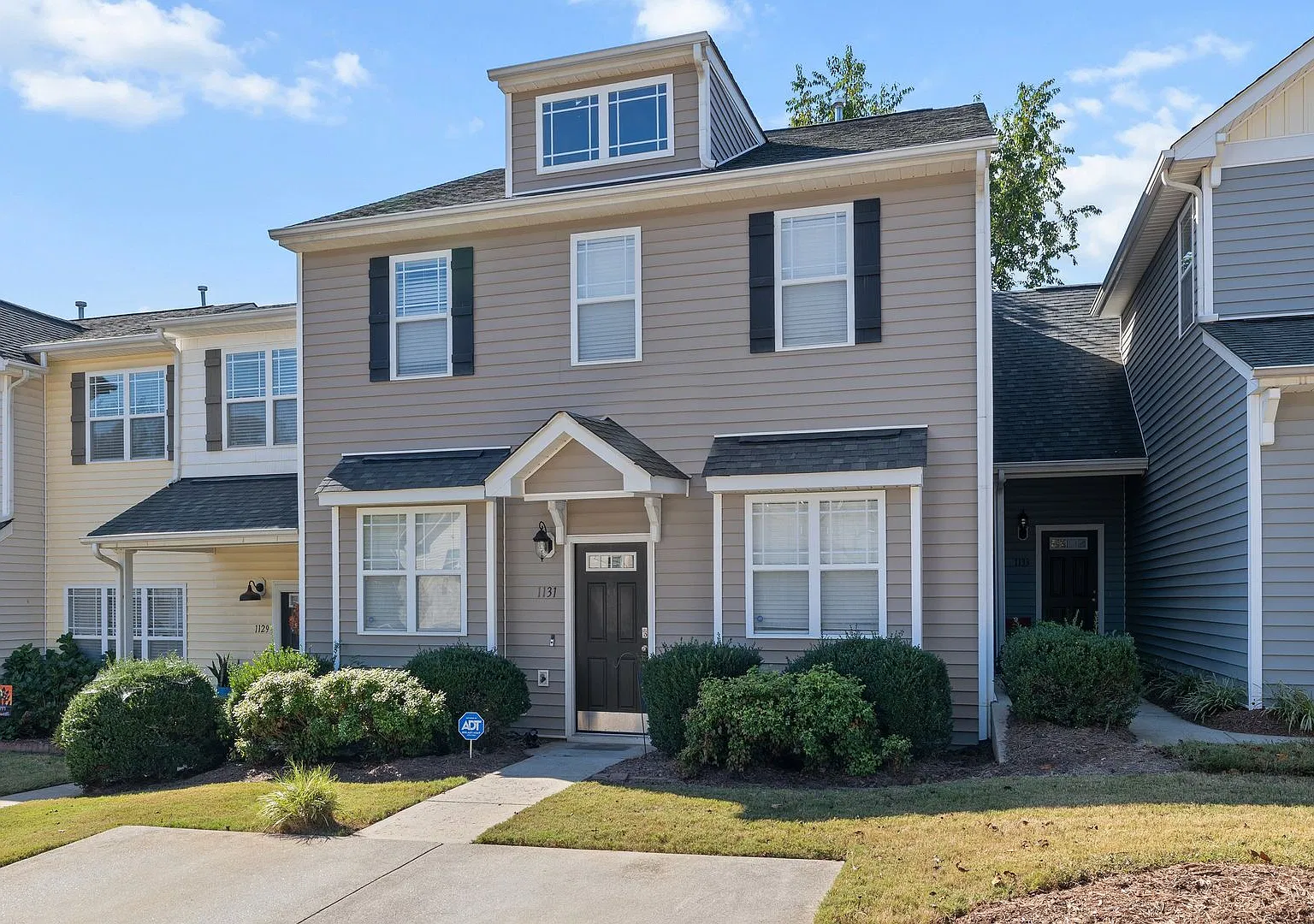 **Beautiful 4 Bed Townhome with First Floor Primary Suite** — Photo 2