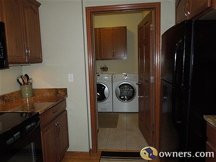 Looking into the laundry area from the kitchen