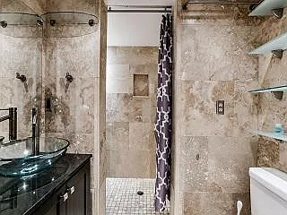 Bathroom 1: with Dual Showers