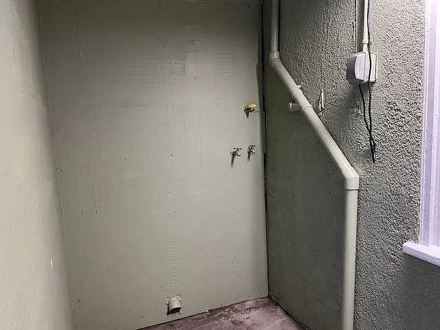 Separate, enclosed laundry room
