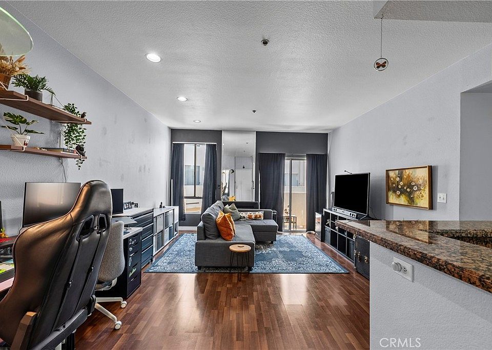 1st image of 19350 Sherman Way Unit 328