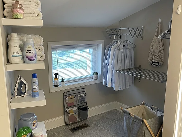 3rd floor laundry area attached to bathroom