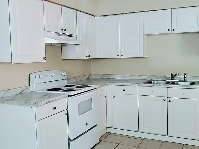7704 N Taliaferro Ave — Photo 5