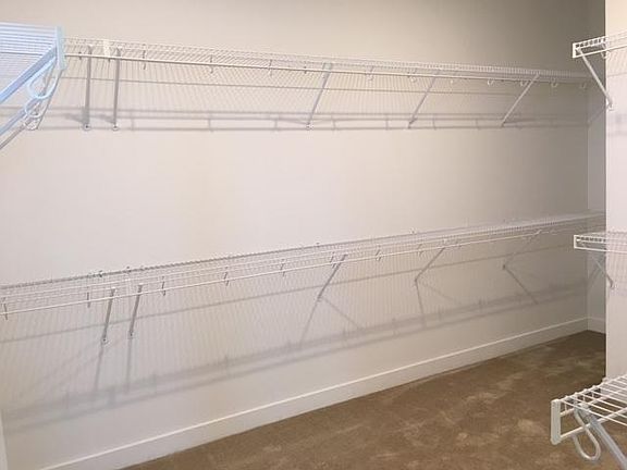 MASTER BEDROOM WALK IN CLOSET