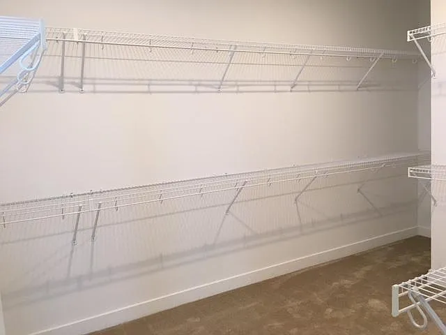 MASTER BEDROOM WALK IN CLOSET