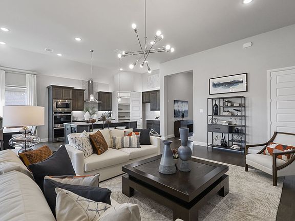 Open living space in in the Allure home plan by Trophy Signature Homes - REPRESENTATIVE PHOTO