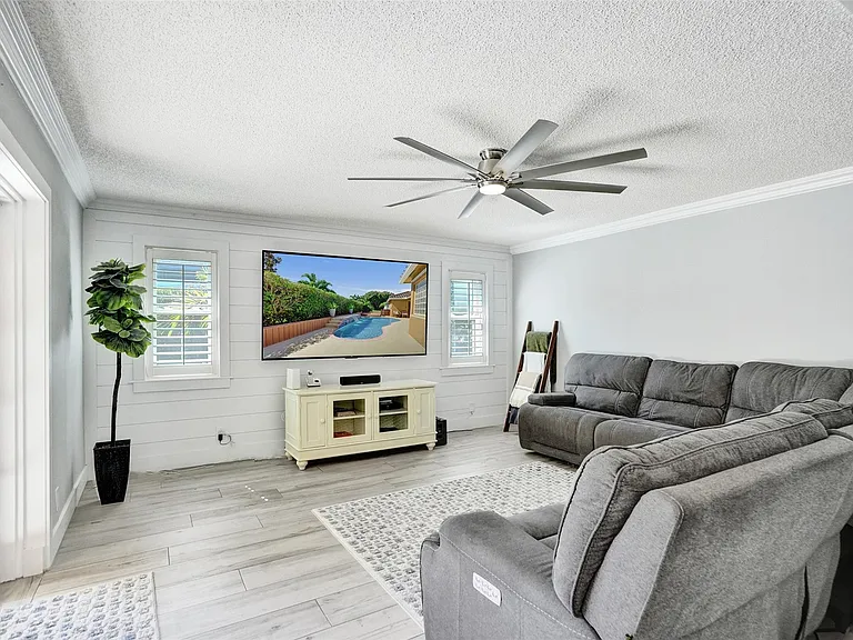 4142 NW 58th Dr — Photo 27