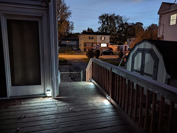 Walkway lighting for rear entrance and stairs.