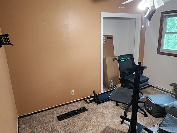 Main bedroom - room is being repainted, replacing closet doors and trim.