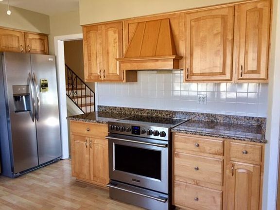 marble countertop, stainless appliances