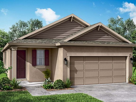 Cypress Farmhouse elevation available only at BridgeWater in Lakeland FL by William Ryan Homes Tampa