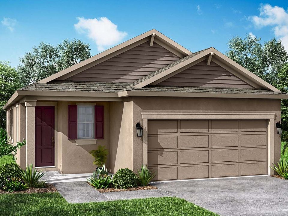 Cypress Traditional elevation available only at BridgeWater in Lakeland FL by William Ryan Homes Tam