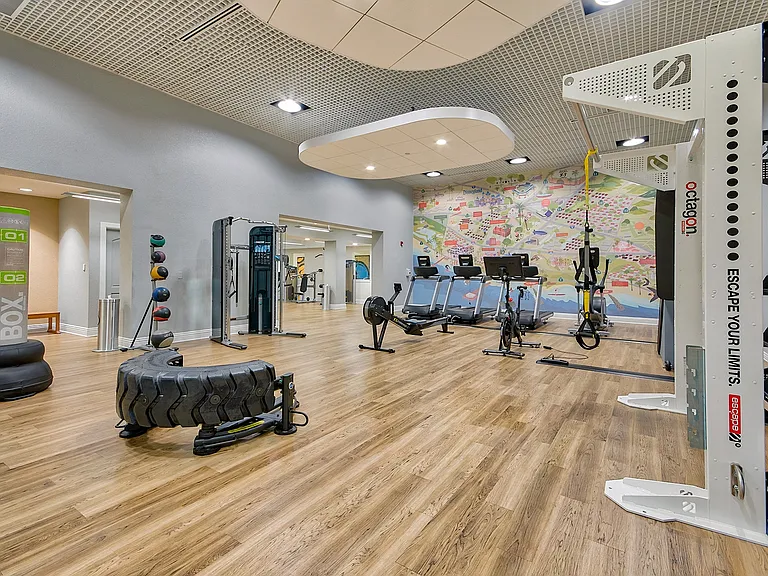 Fully equipped fitness center with cardio and weights