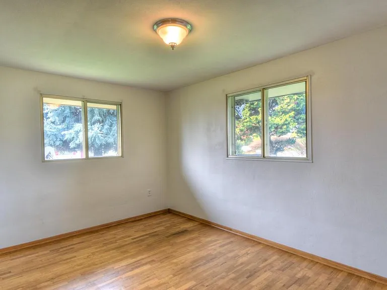 Corner Bedroom - Brand new energy efficient window treatment (not pictured).