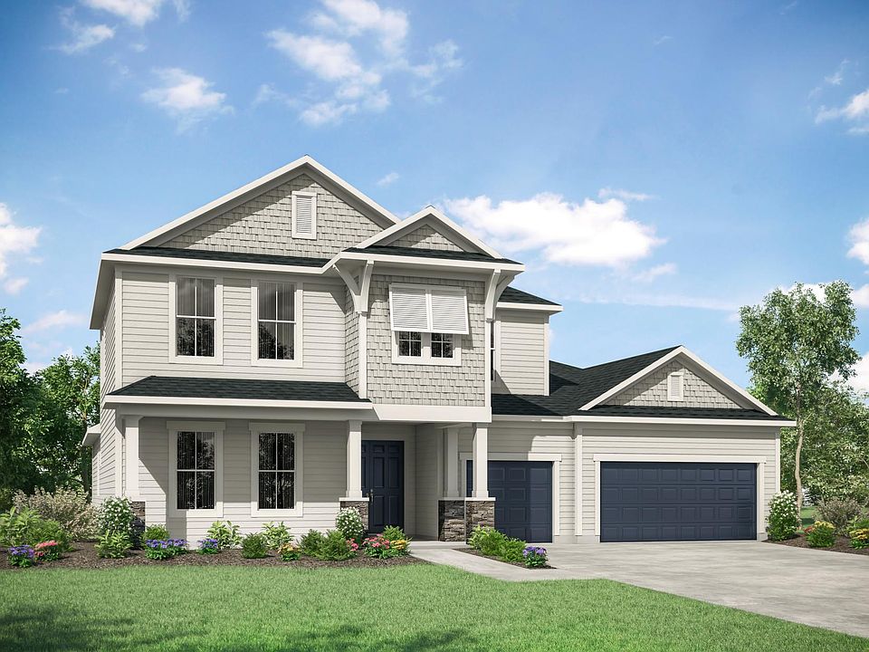 custom home with siding and shakes