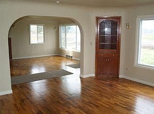 Formal dining room looking into living room.