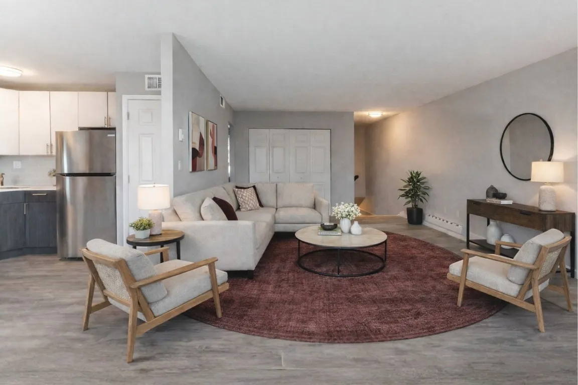 Step into comfort and style at Newpointe Apartments. Our spacious living room features modern design elements, perfect for relaxation and entertaining. Embrace your new lifestyle todayschedule a tour and find your ideal home!
