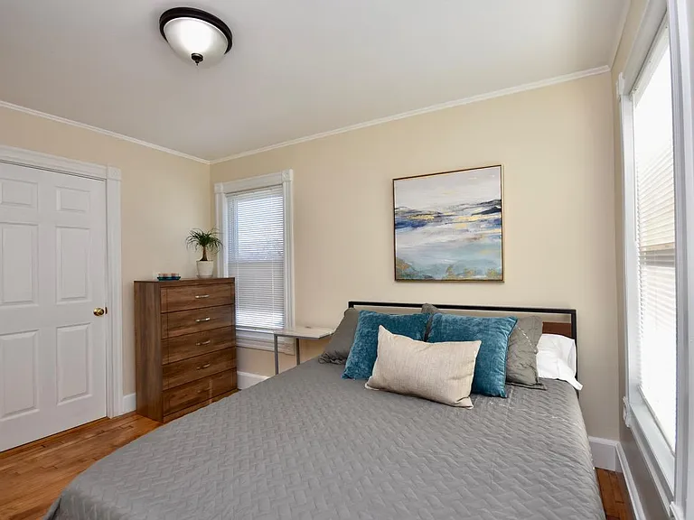 Bedroom with queen bed and 43" Smart TV