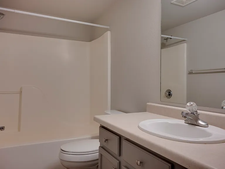 Guest bathroom shared with hallway.