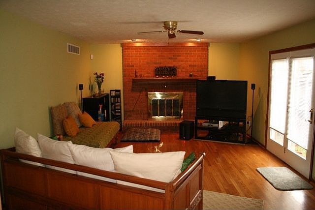 Greatroom with fireplace view from Breakfast Area