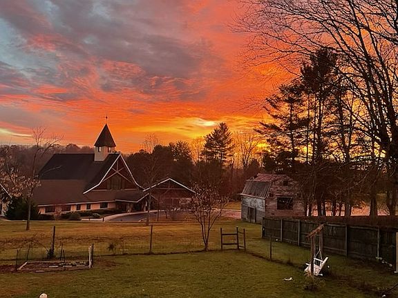 Tenant took pic from back deck, looking at St. Joan of Arc church