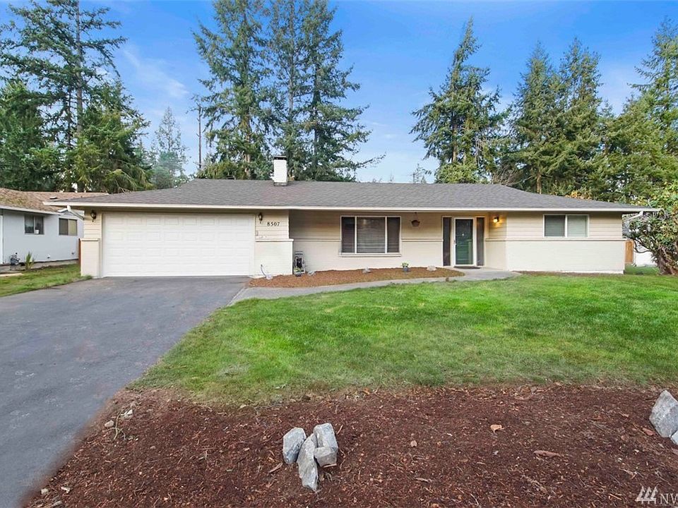 Beautiful rambler with long driveway for additional parking.