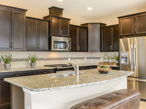 Kitchen with Island for Meal Planning at Home or Entertaining with Friends