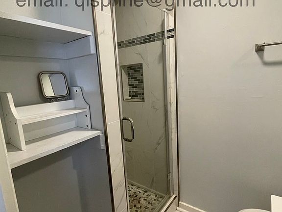 Private bathroom with shower
