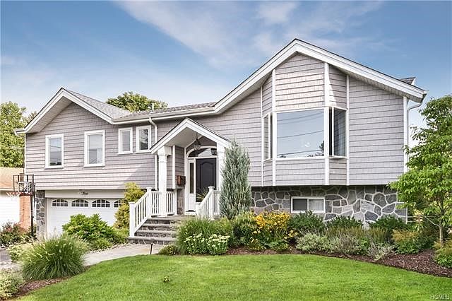 Welcome Home to this Ardsley Gem. Totally renovated inside and out. Magnificent Landscaping.